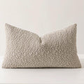 Textured bouclé-style lumbar throw pillow in beige
