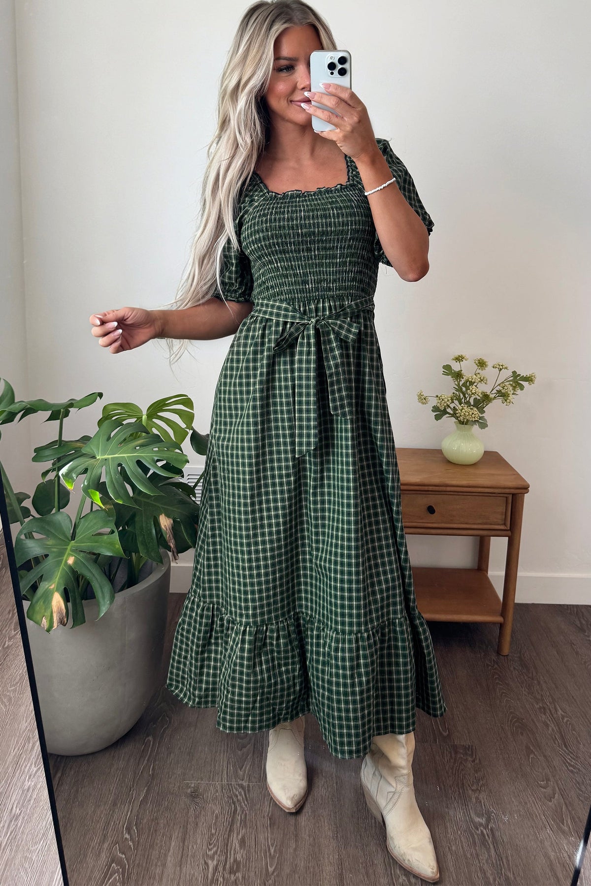 Green plaid square-neck shirred waist maxi dress with puff sleeves and tiered ruffle hem.