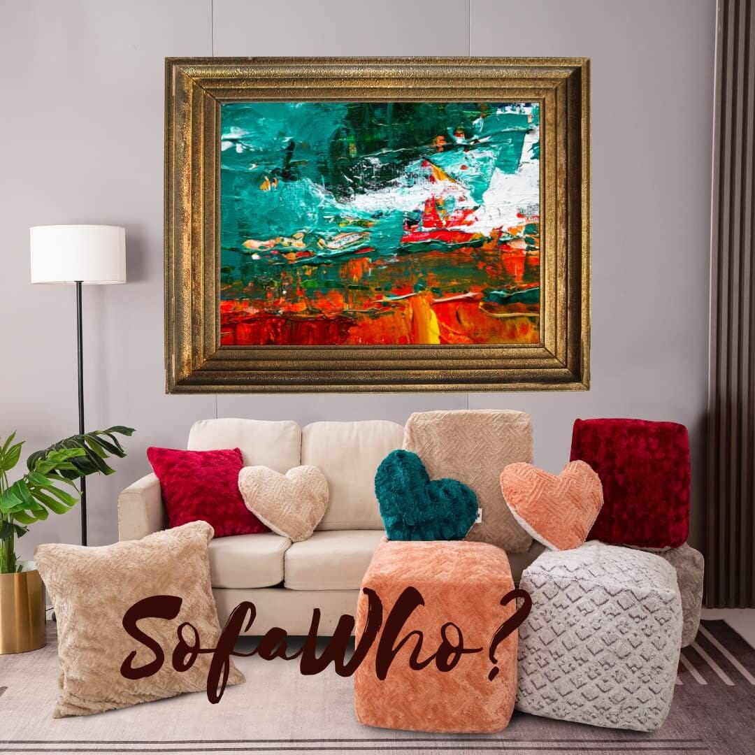 Champagne beige heart-shaped plush throw pillow on a sofa