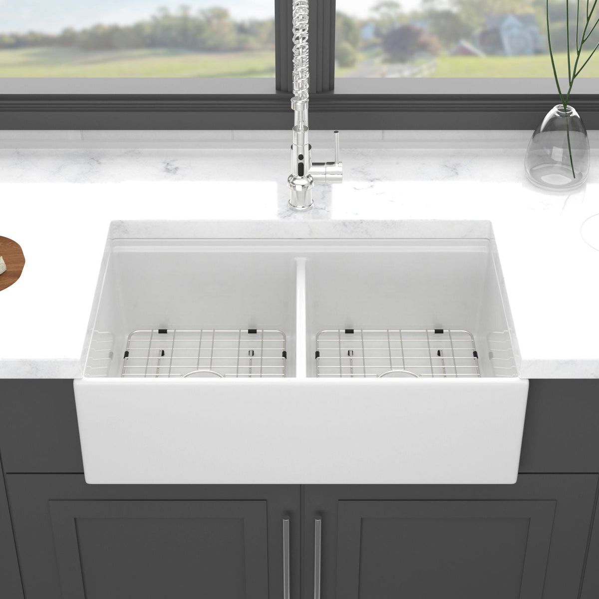 White ceramic double-basin sink showing interior divider and fitted rack inserts