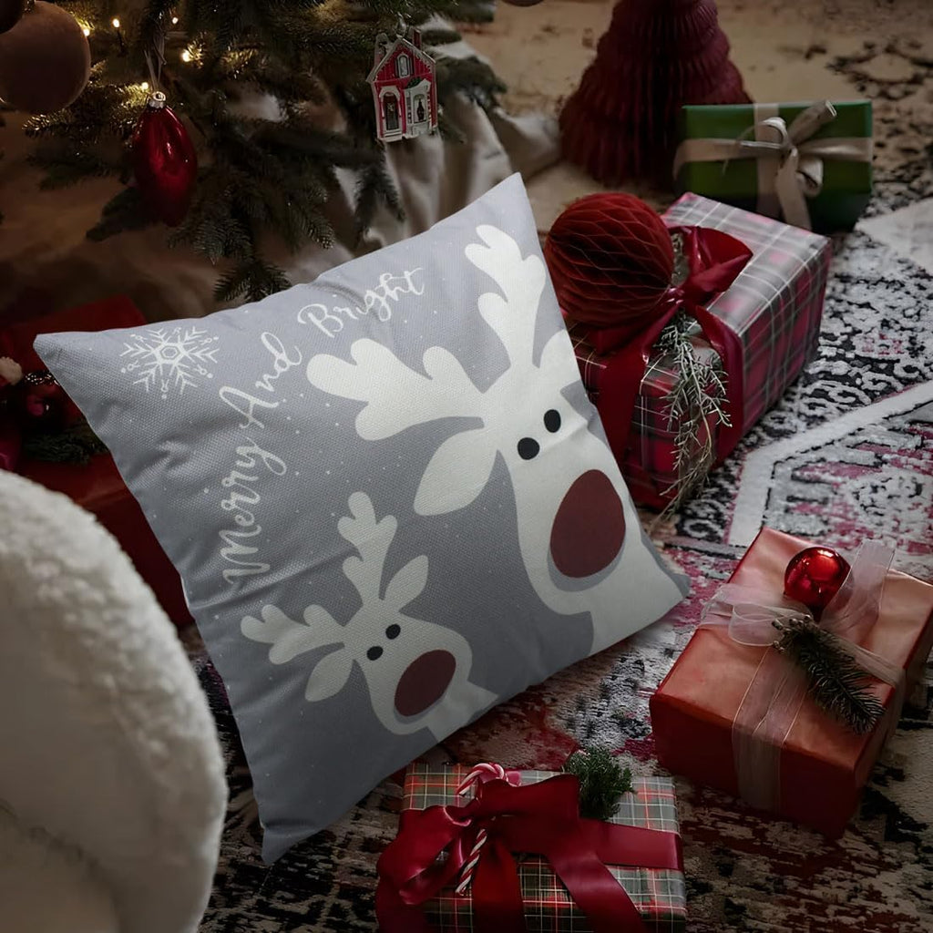 Two Christmas pillow covers with gray reindeer and snowflake style 'Merry and Bright'