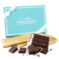Dark chocolate bars with foil-wrapped pieces and a box, 4 square chunks shown
