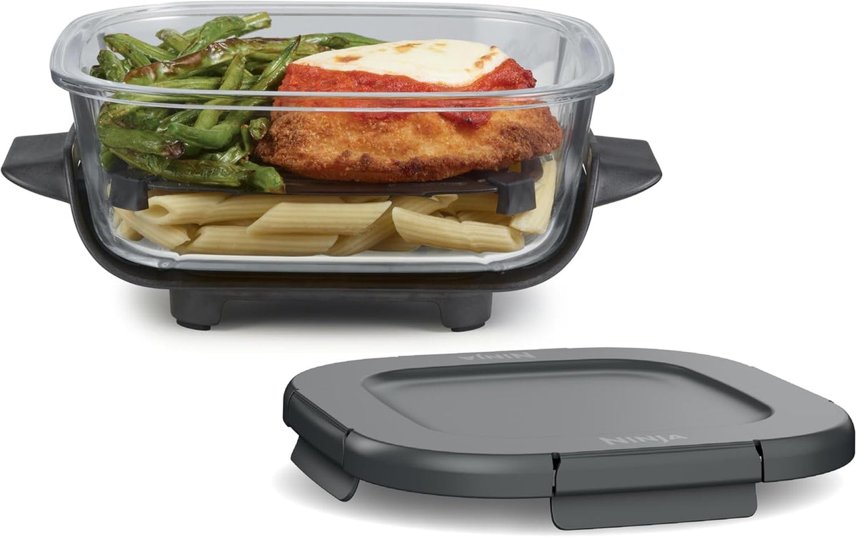 6-cup glass food storage container with leak-proof storage lid, clear base with black handlelets