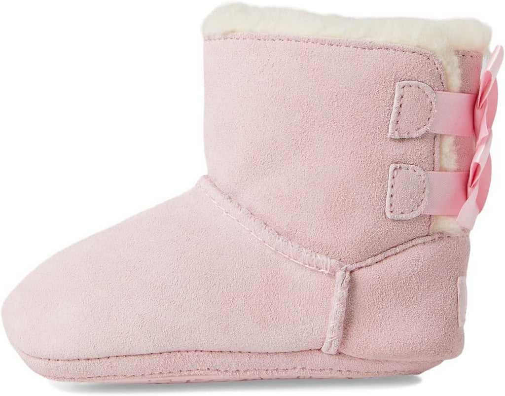 Pink baby suede booties with two side straps and soft fleece cuff lining