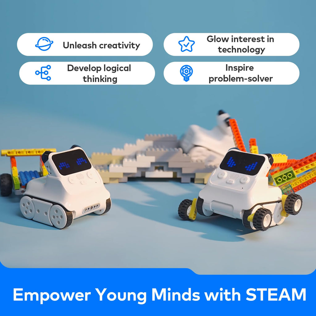 Two white coding robot toys with blue LED displays, positioned on building blocks.