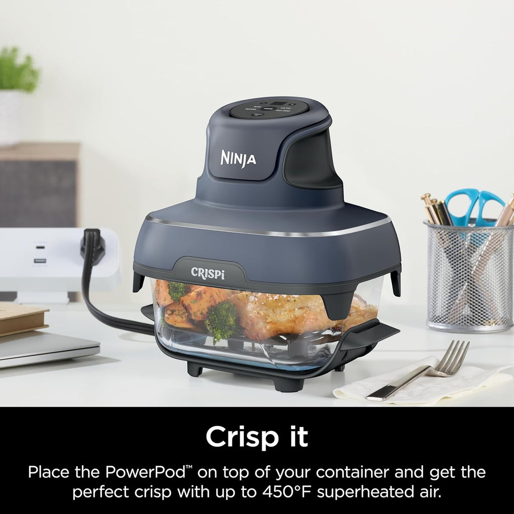 Glass 6-cup container with lid on a countertop, paired with a compact crisper base