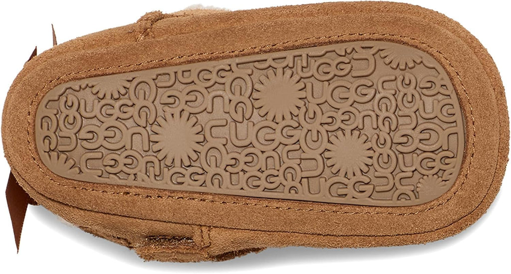 UGG baby Bailey bow boots chestnut suede with patterned rubber outsole, heel view