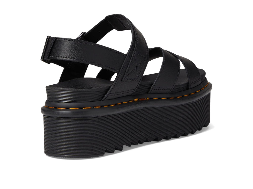 Black strappy platform sandals with adjustable buckle closure and chunky outsole