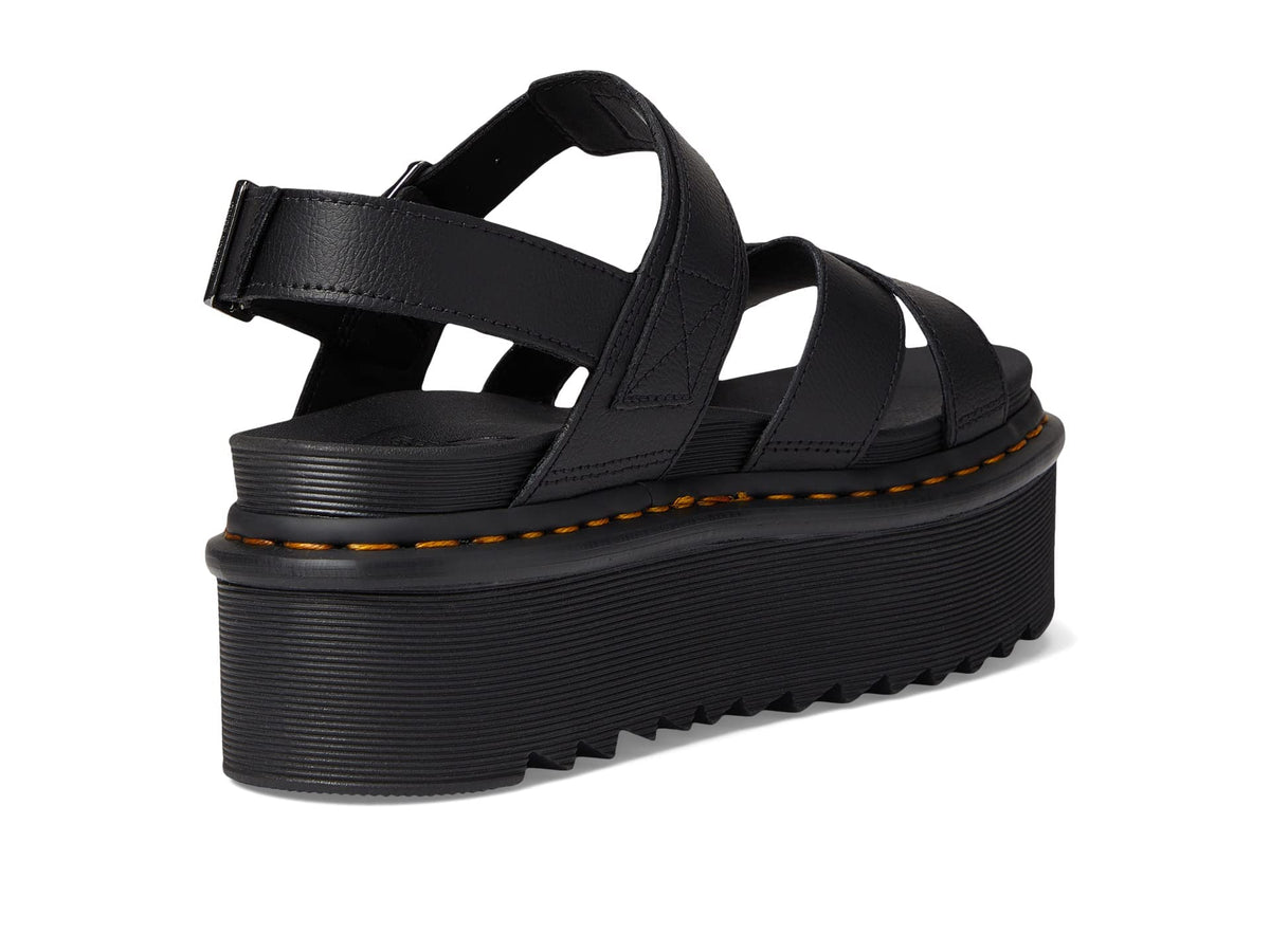 Black strappy platform sandals with adjustable buckle closure and chunky outsole