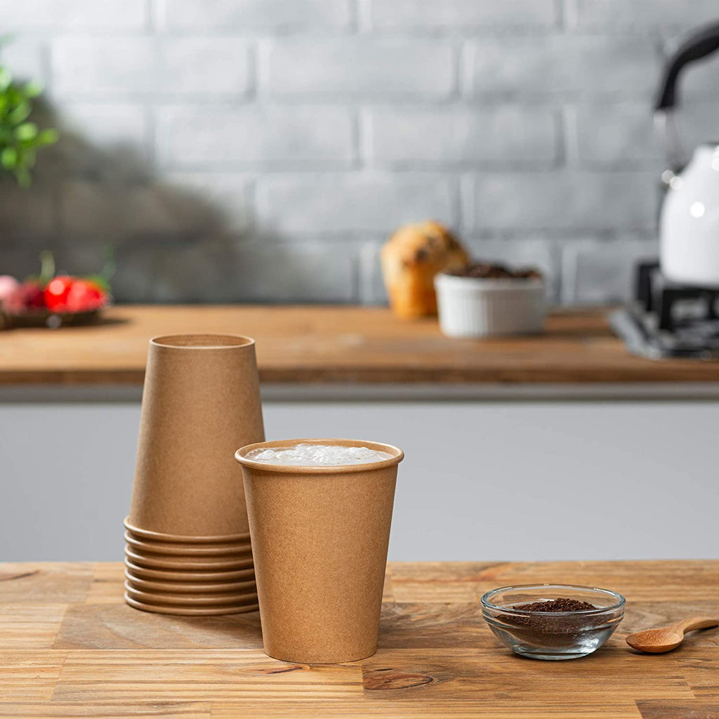 Kraft hot coffee cup stack with single unbleached paper cup