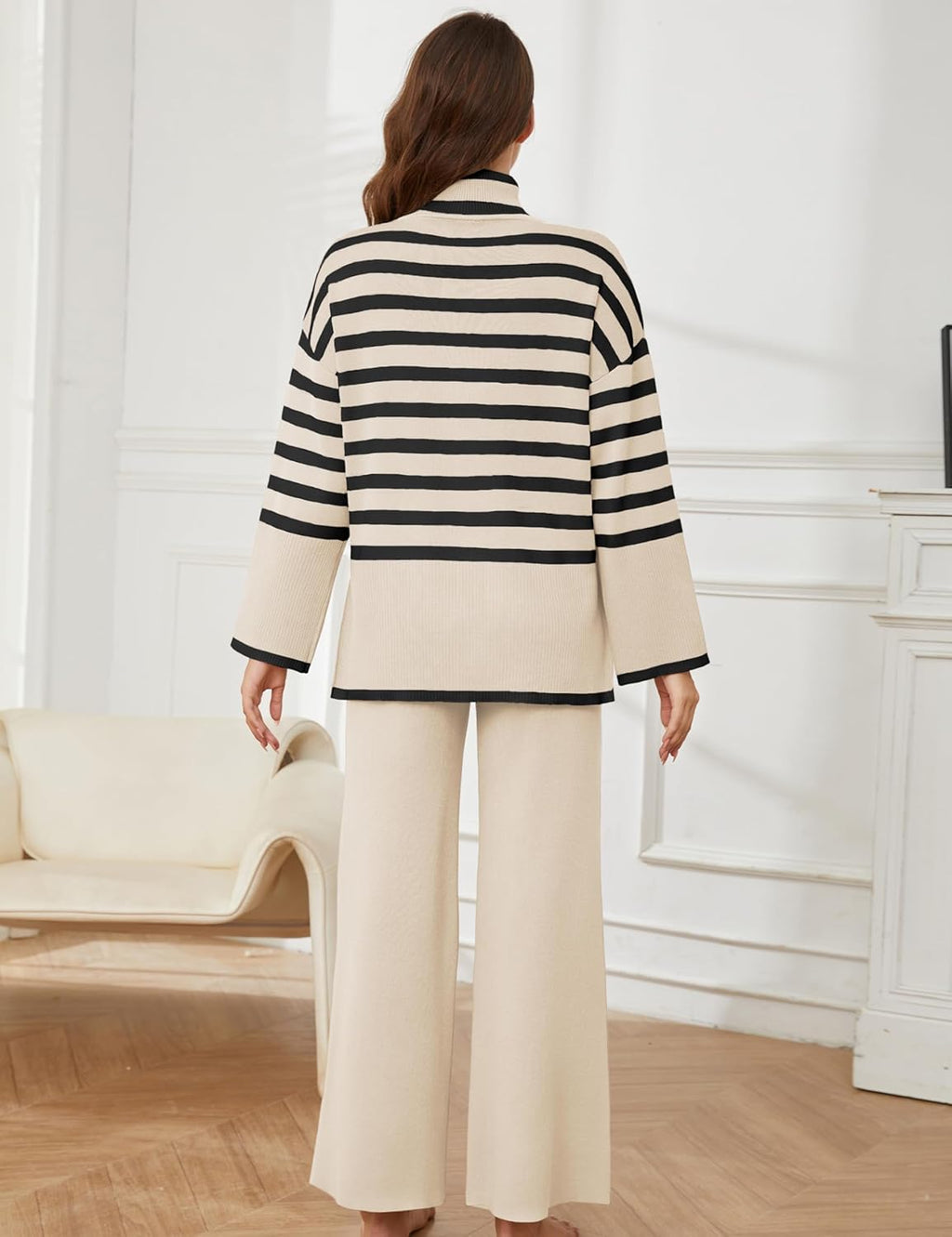 Women’s striped knit sweater and wide-leg pants set, back view in cream and black stripes