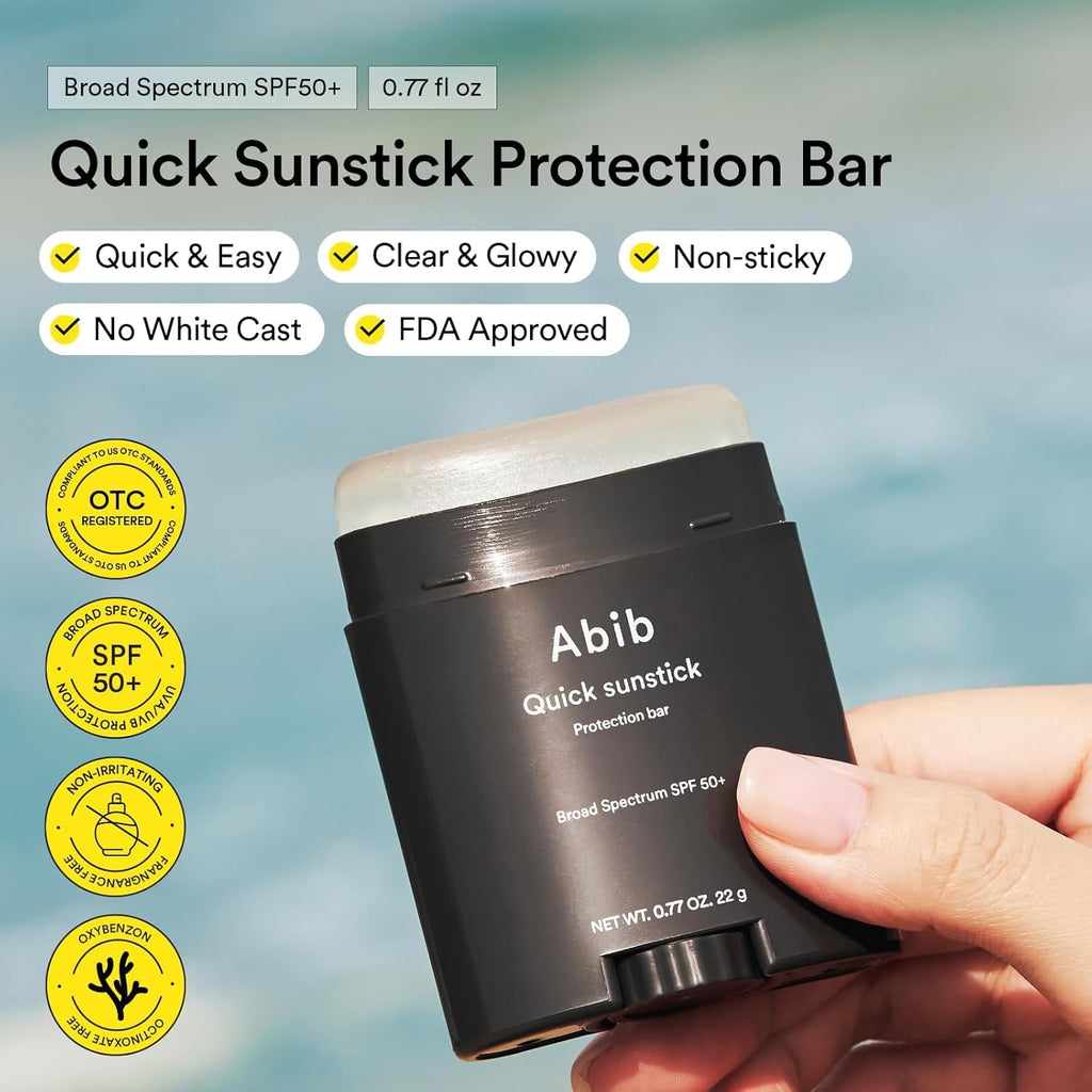 Abib quick sunstick protection bar SPF50+ shown in hand with label front