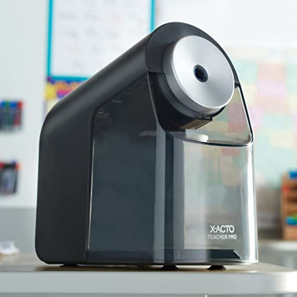 Black X-ACTO Teacher Pro electric pencil sharpener with silver dial and clear shavings container.