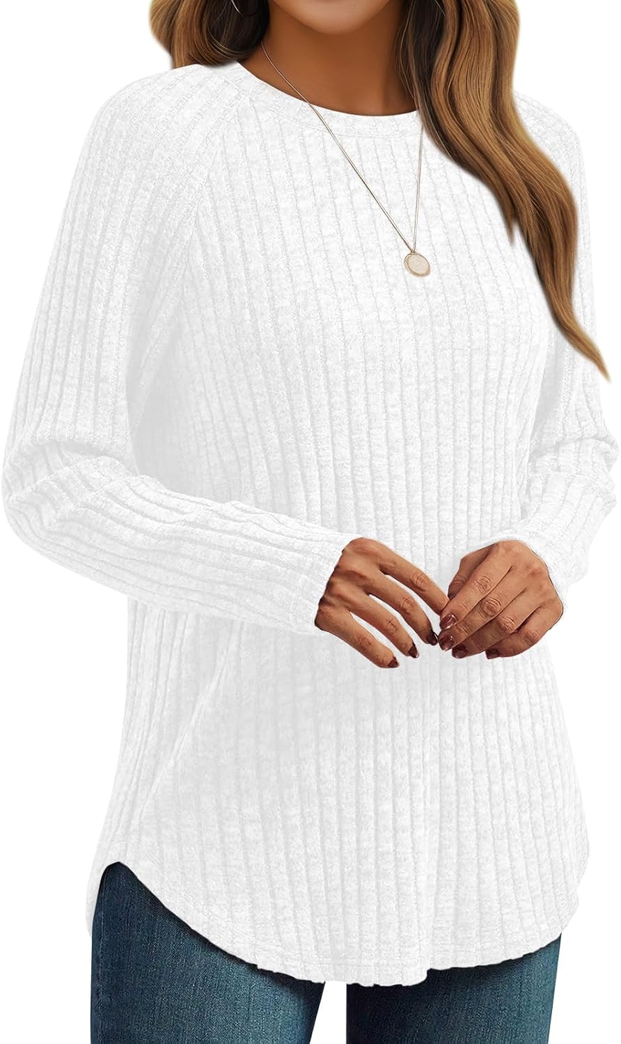 White ribbed knit long-sleeve crewneck tunic top with loose fit and curved hem