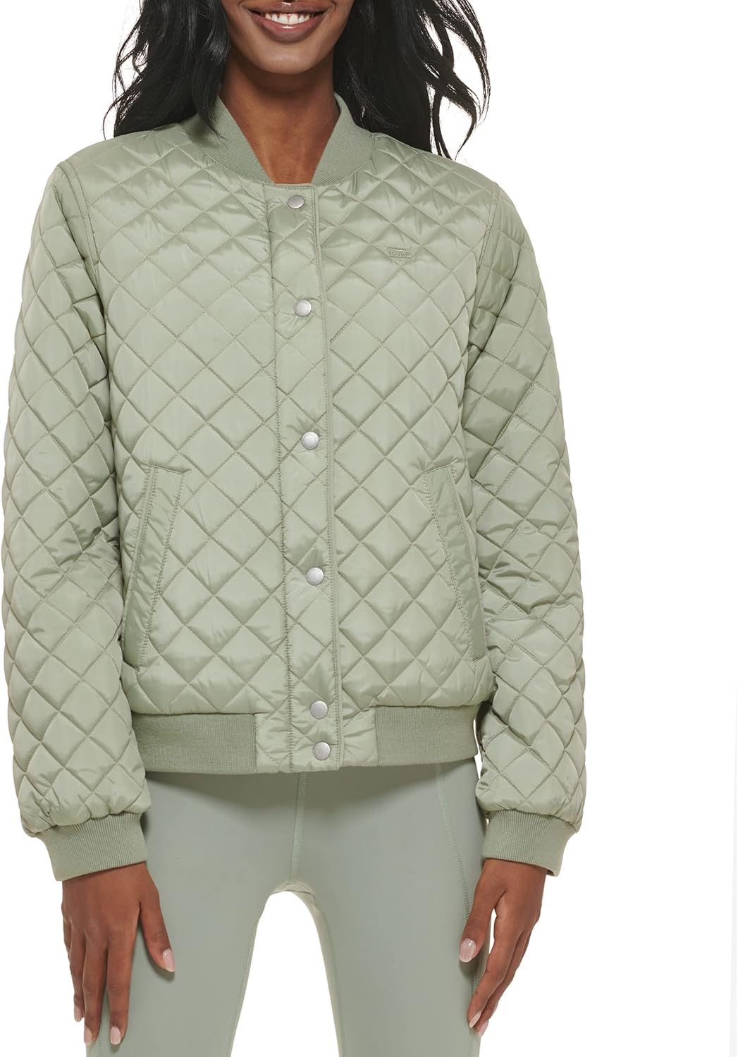 Quilted bomber jacket in light sage with button front placket, ribbed cuffs and hem