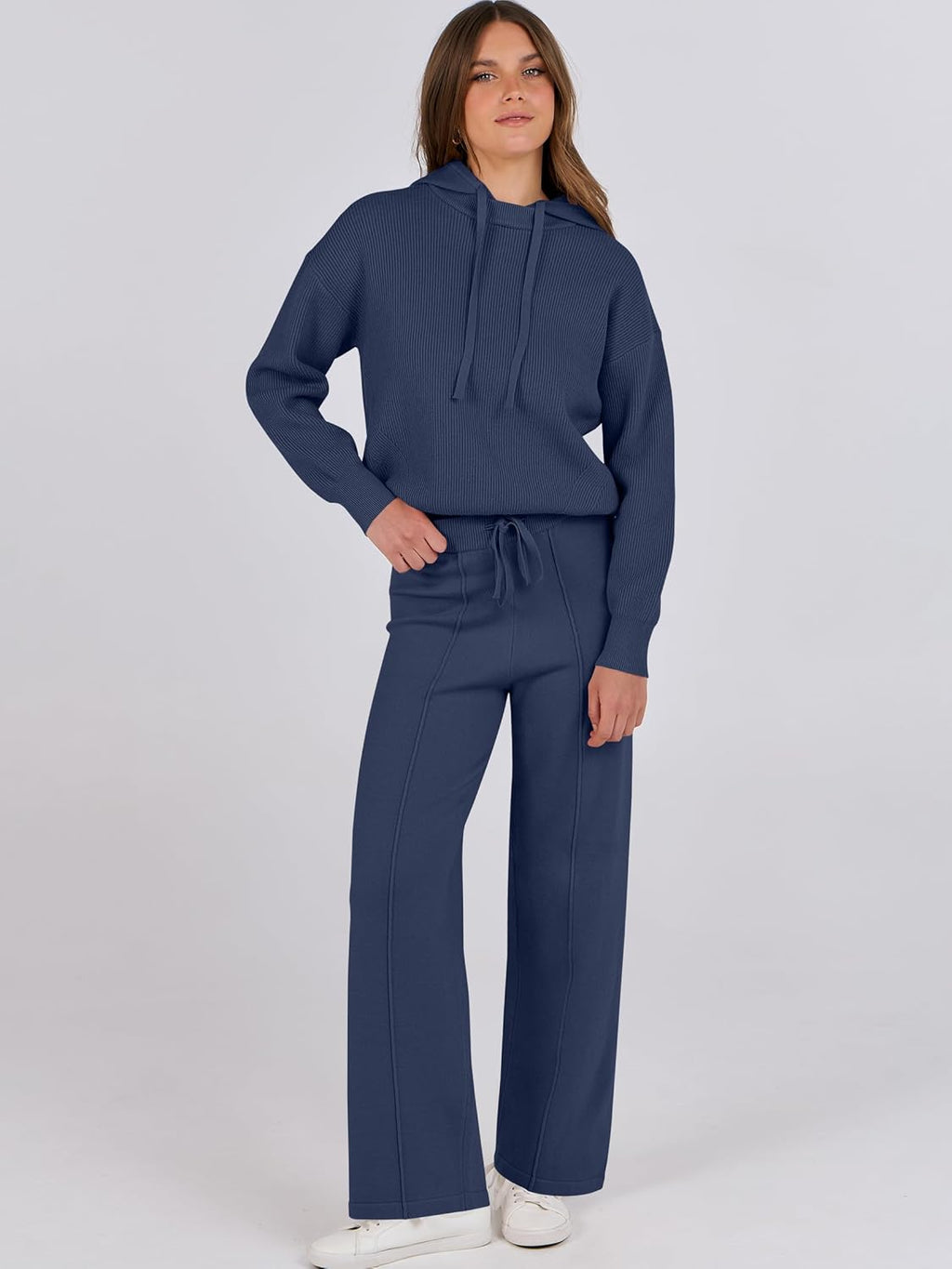 Navy pullover hoodie and wide-leg sweatpants two-piece set worn by model