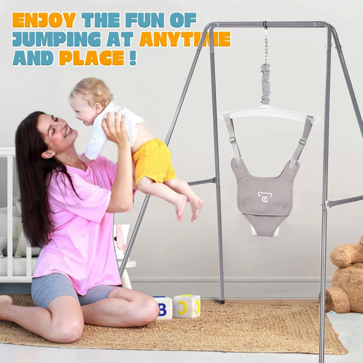 Grey baby jumper with stand shown with child and standing frame