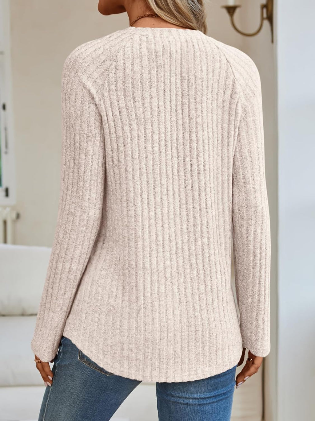 Beige ribbed crewneck long-sleeve tunic top, back view