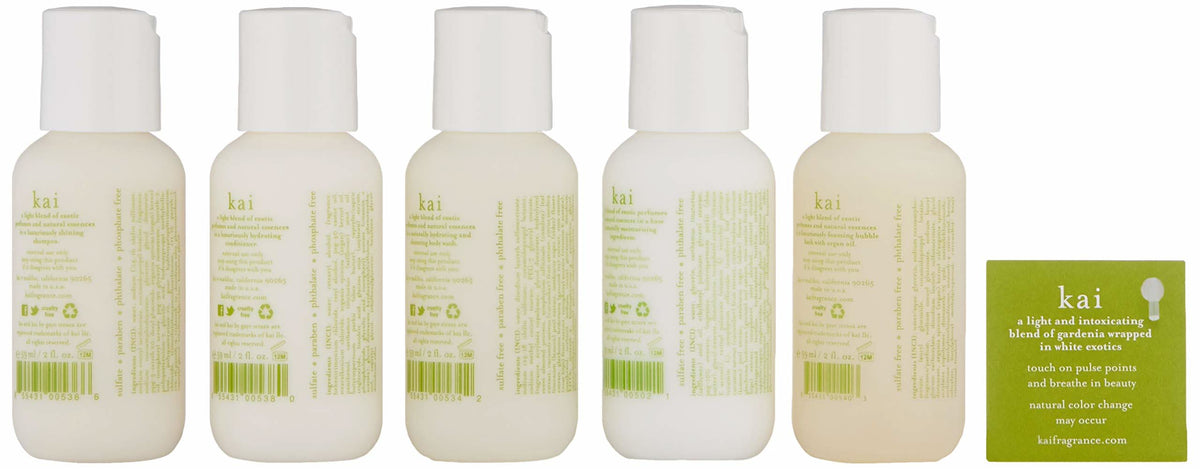 Five labeled beige travel bottles with white caps and green product card