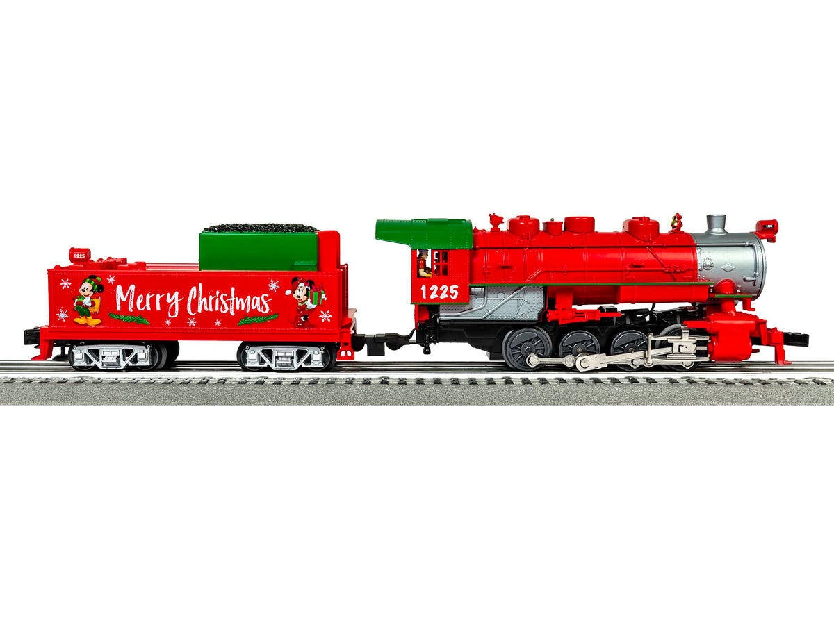 Red caboose-style train car with Merry Christmas text and green roof