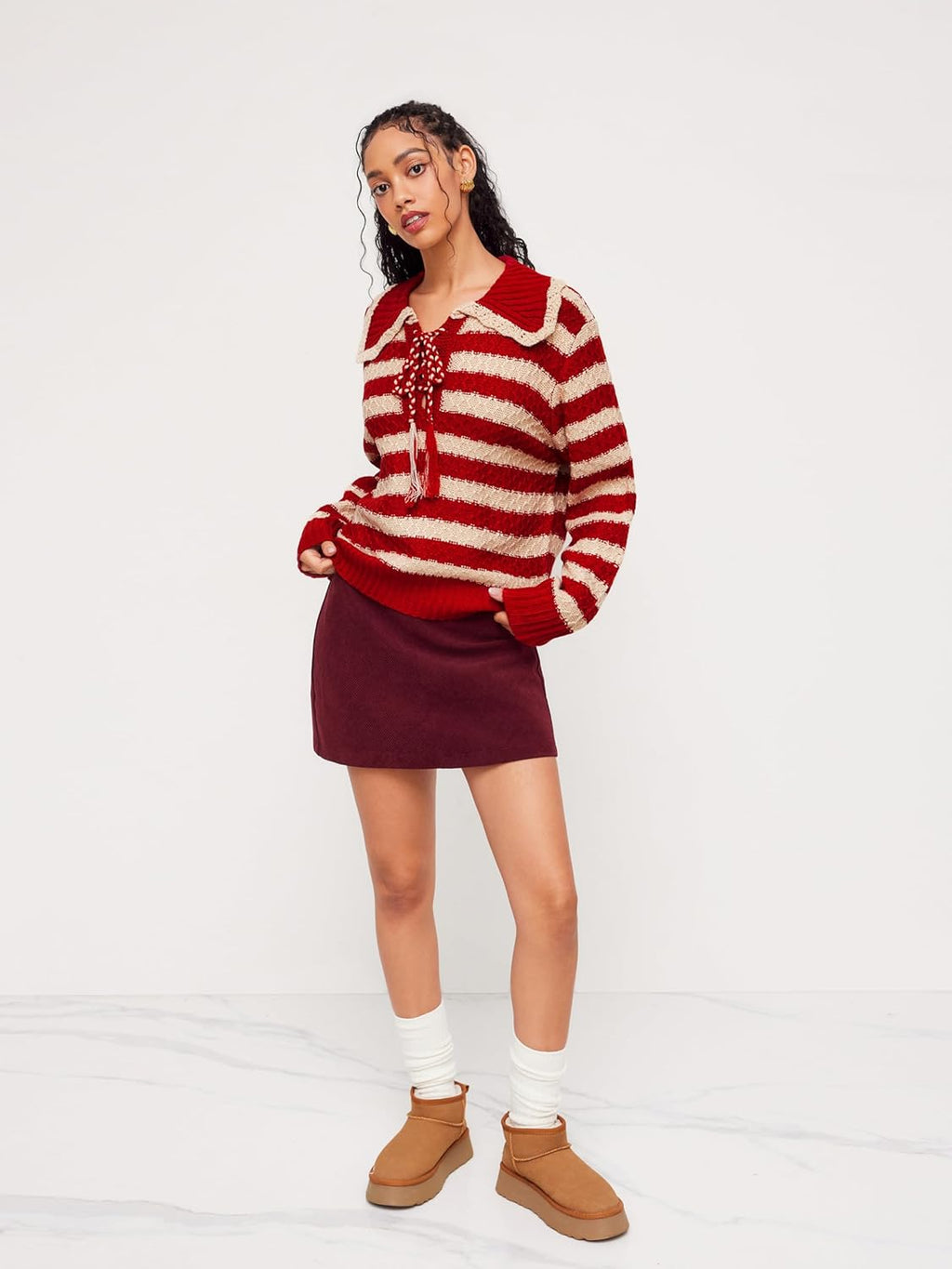 Red and cream striped collared knit pullover sweater with long sleeves and tassel tie