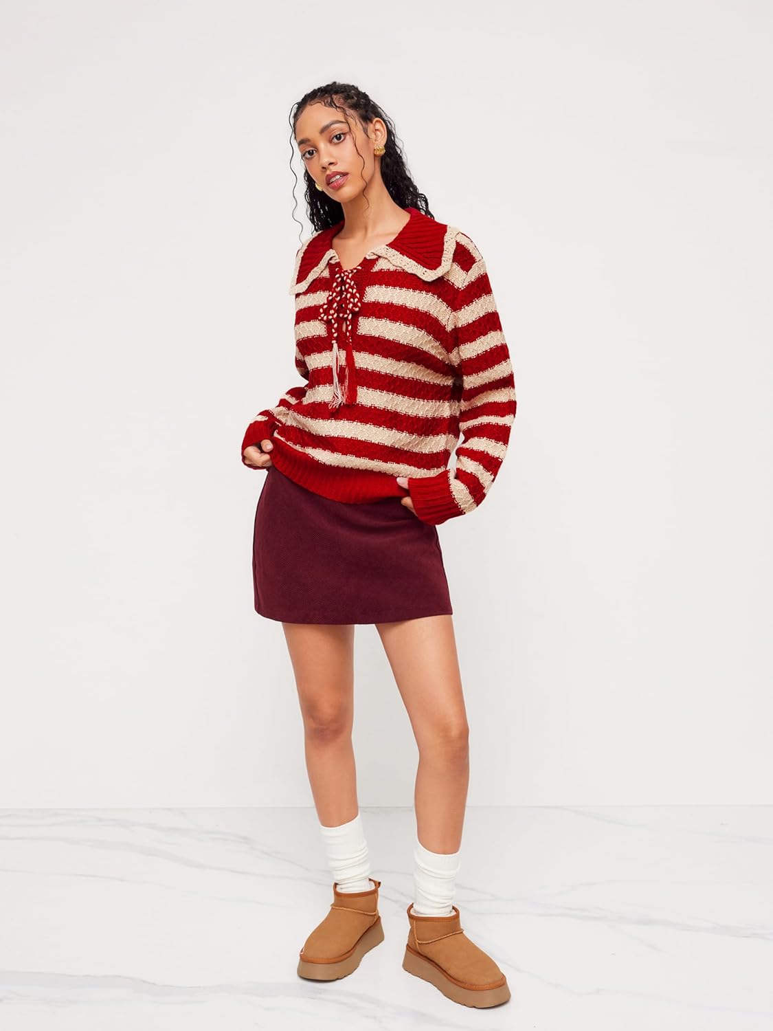 Red and cream striped collared knit pullover sweater with long sleeves and tassel tie