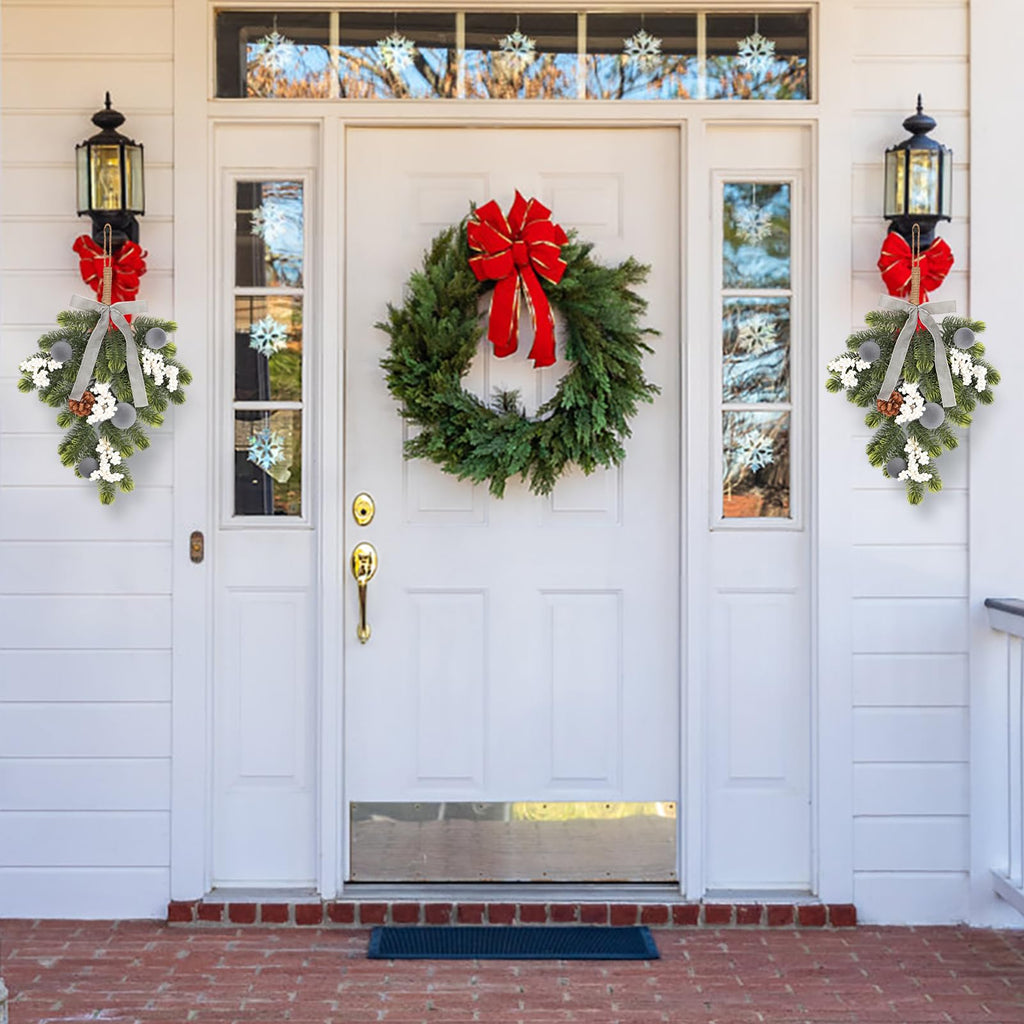 Green wreath with a large red bow displayed on a front door