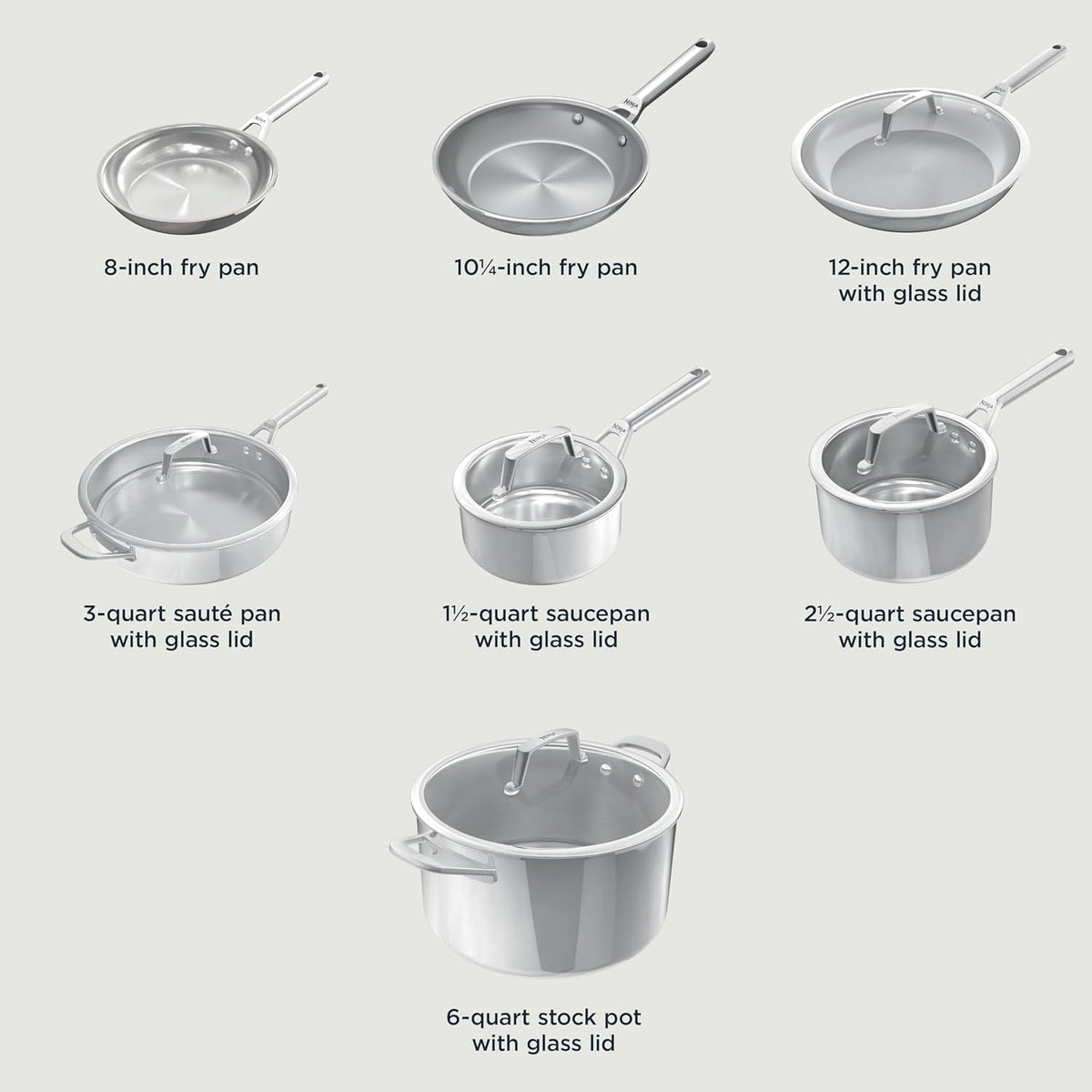 Stainless steel frying pans and saucepans with glass lids, 8-inch to 6-quart sizes shown