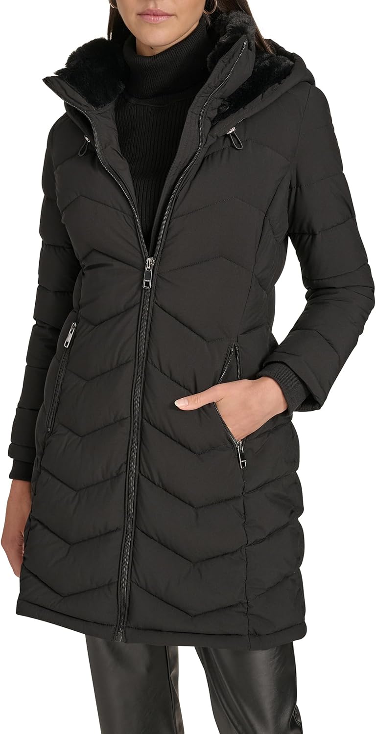 Women’s long puffer jacket in black with hood, full zipper, and zip hand pockets