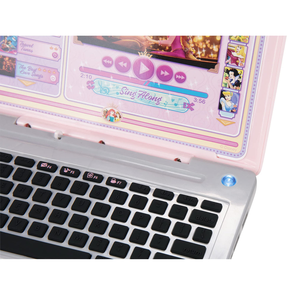 Close-up of pink kids laptop keyboard with shortcut buttons and screen display