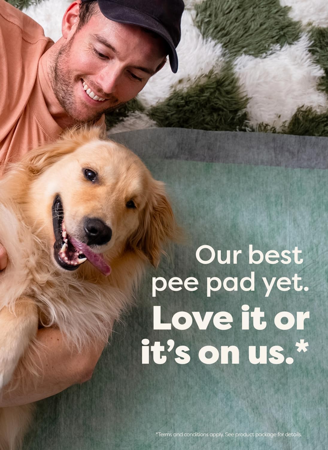 Dog and smiling person beside a pee pad with Love it or it’s on us text