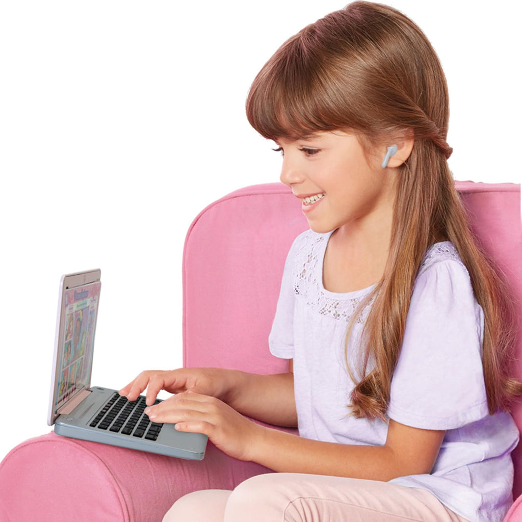 Kids using a pink laptop with open screen and black keyboard on a chair
