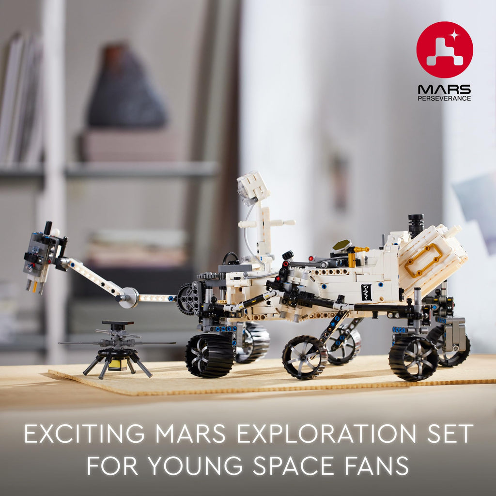 LEGO Technic Mars rover build with articulated wheels and robotic arm on display