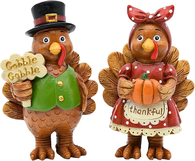 Resin turkey couple figurines with top hats, green and red outfits, standing together.