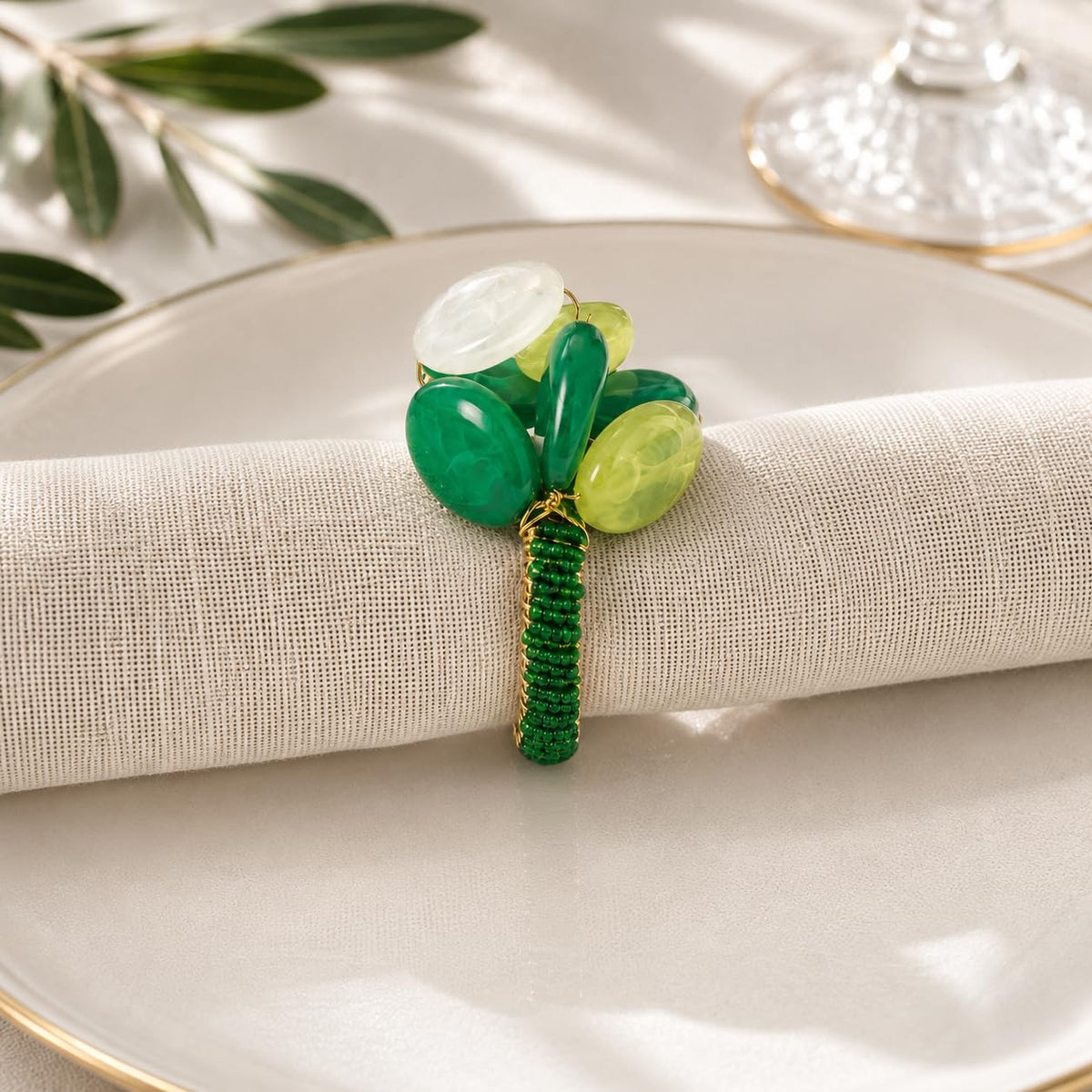 Green gemstone beaded napkin ring with mixed green oval glass stones