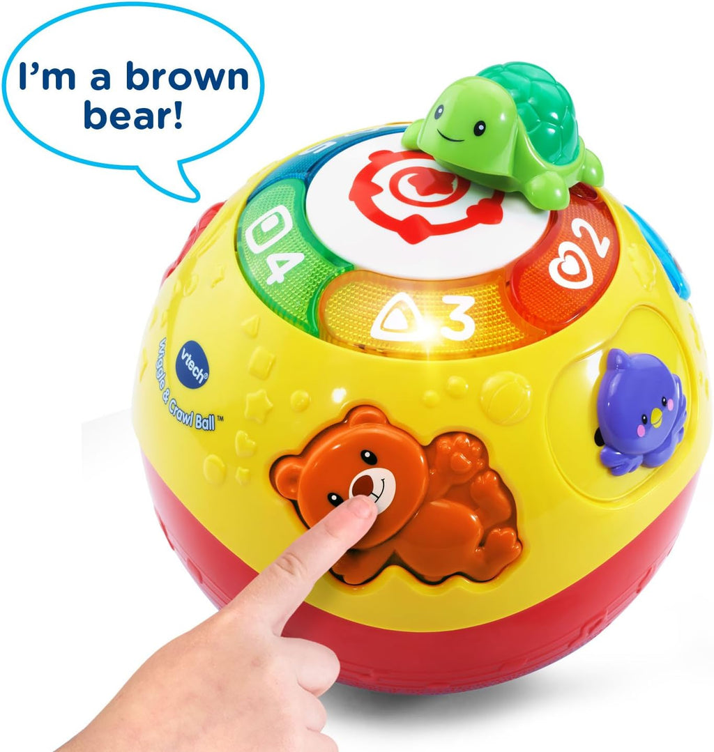 Yellow rolling ball with green turtle and brown bear figure; finger points at dial