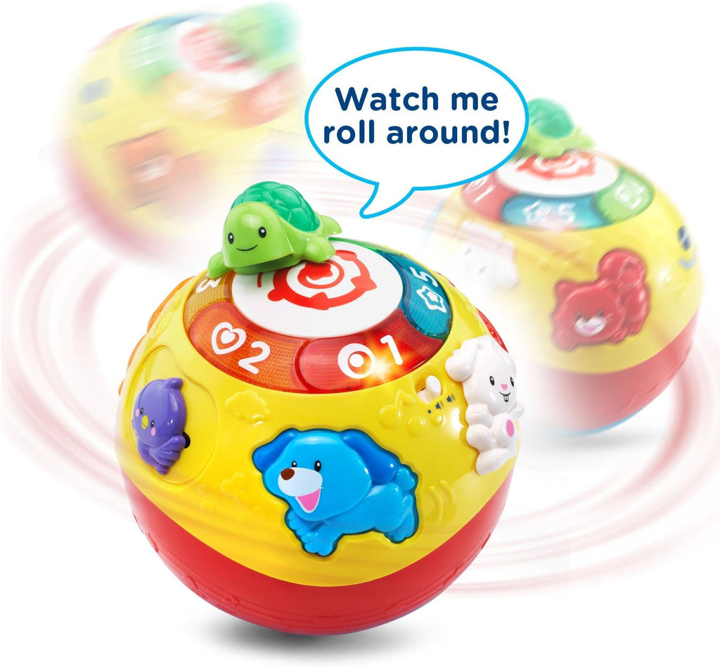 Yellow rolling ball with green turtle top and numbered panels, showing motion blur
