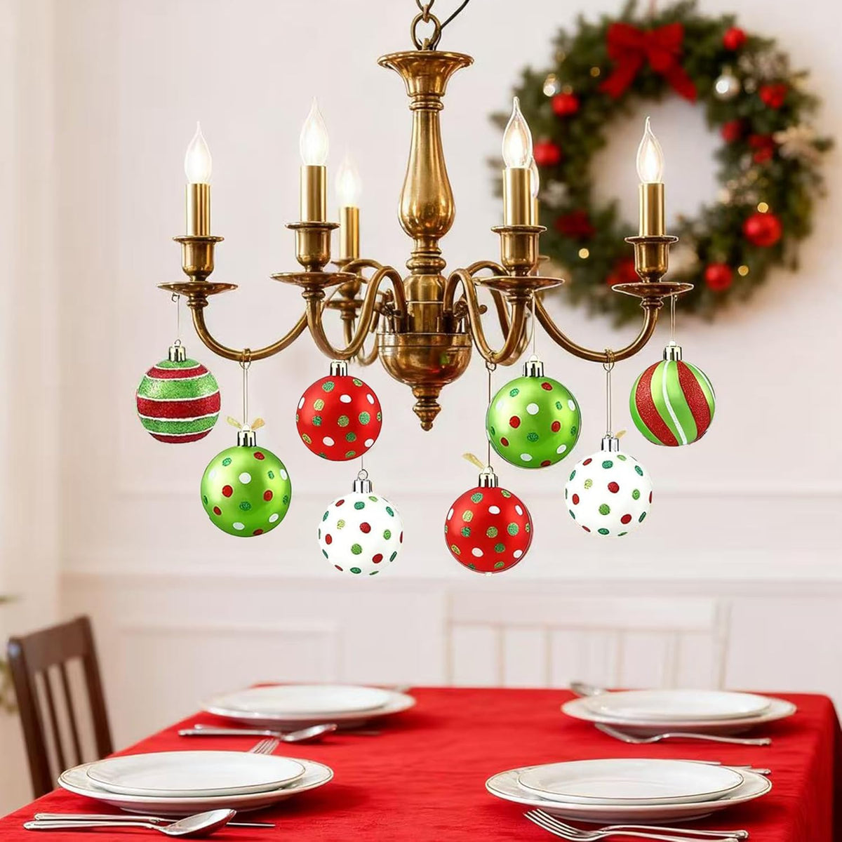 Hanging Christmas ball ornaments in red, green, and white striped and polka-dot styles