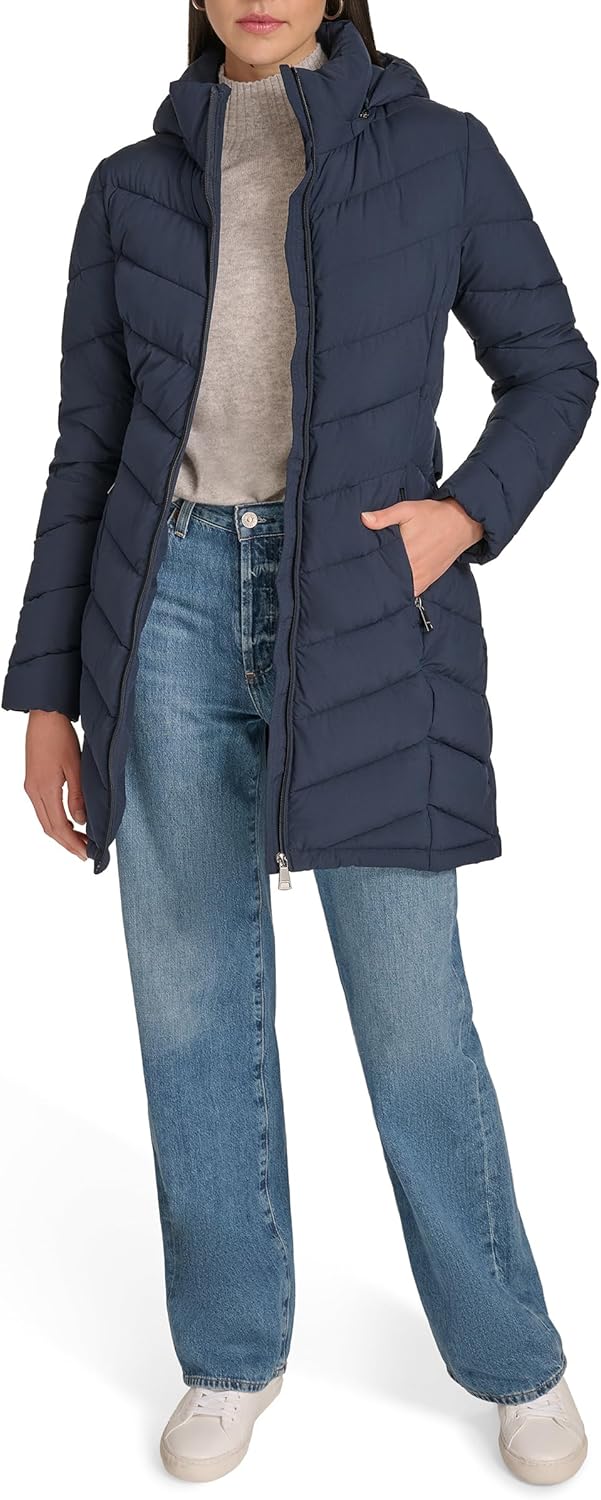 Women's long puffer jacket, dark navy with front zipper, hood, and side pockets
