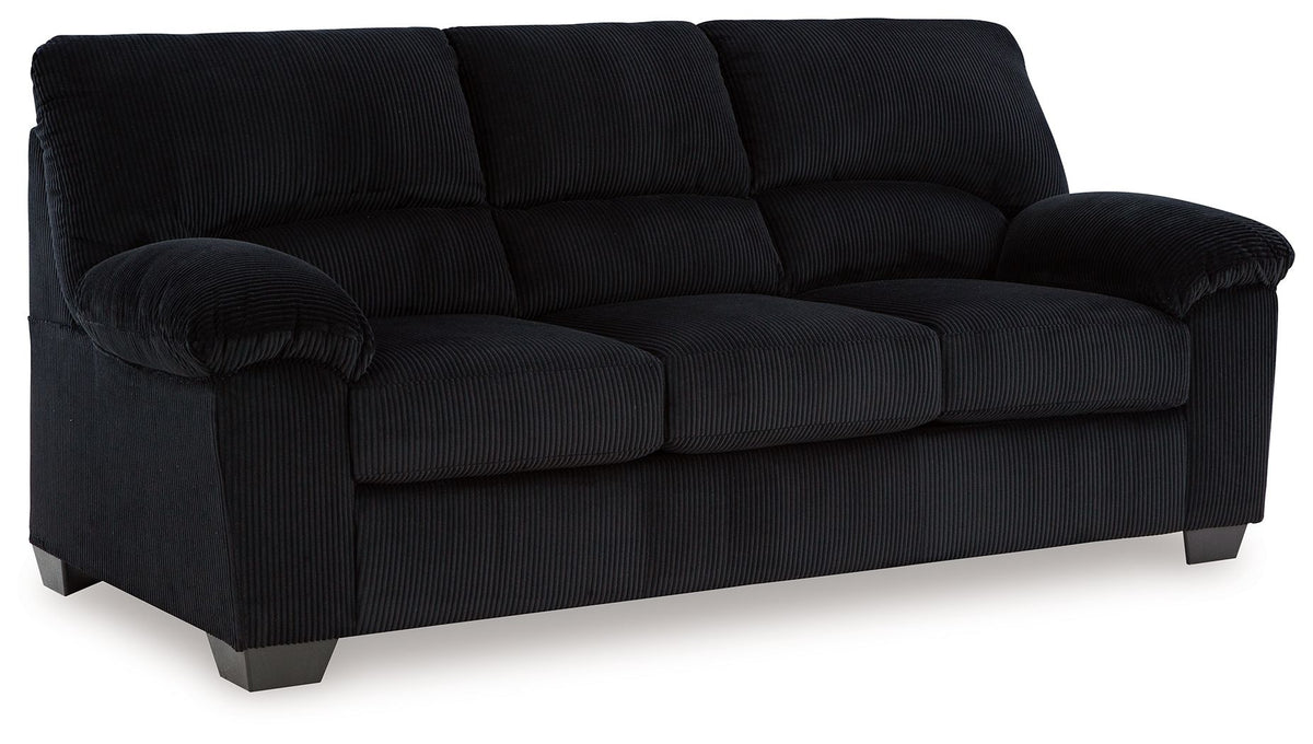 Upholstered sofa in dark fabric, three-seat profile with tufted back and armrests