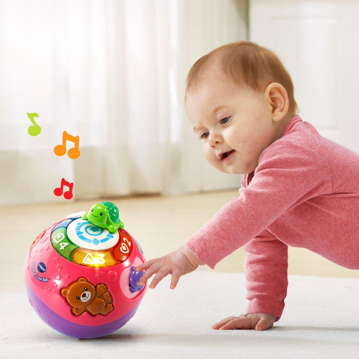Pink and purple rolling ball with green turtle, brown bear, and number dials
