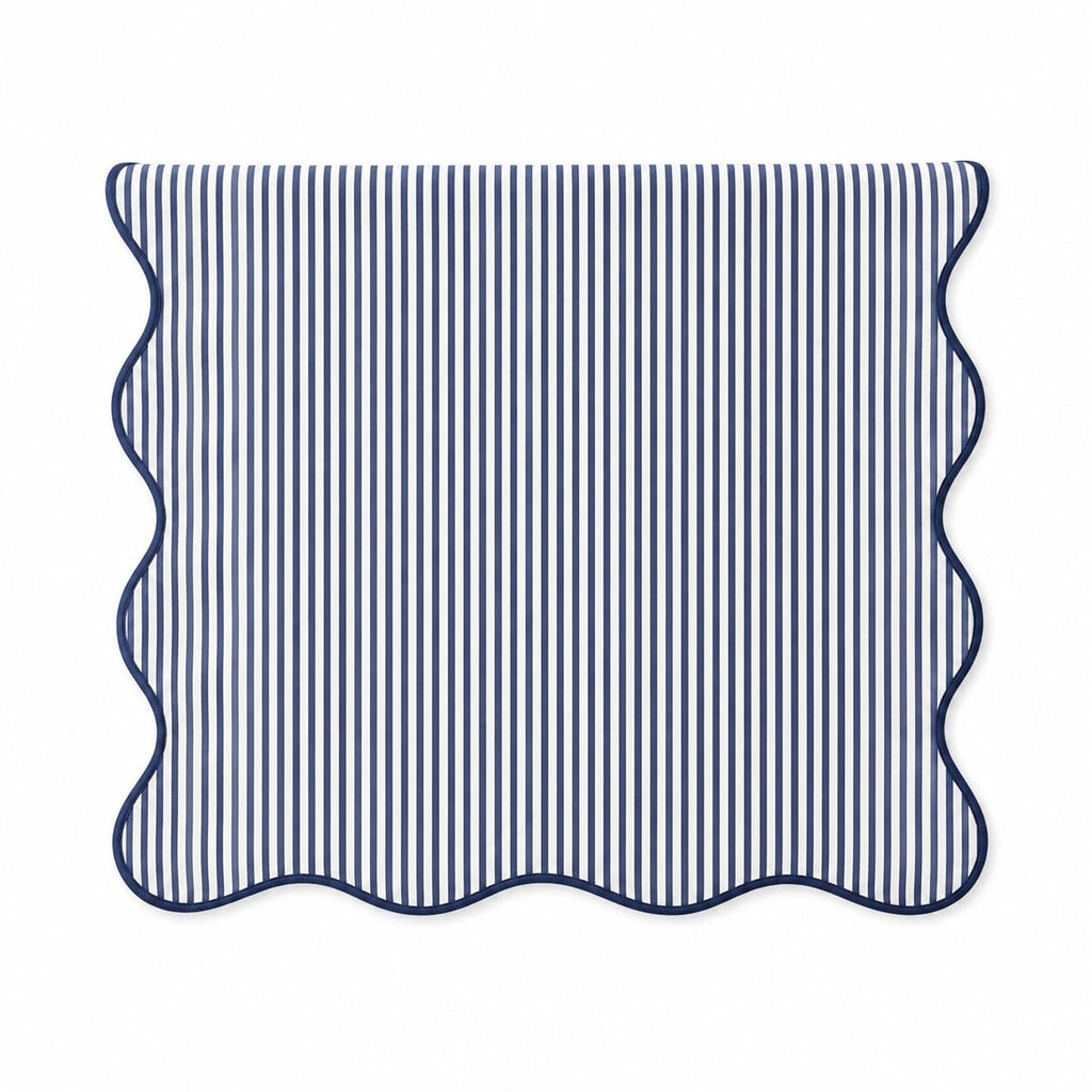 Navy and white striped table runner with scalloped edges, lined