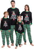 Family Christmas pajama set with black tops, green trim, and green plaid pants for four people