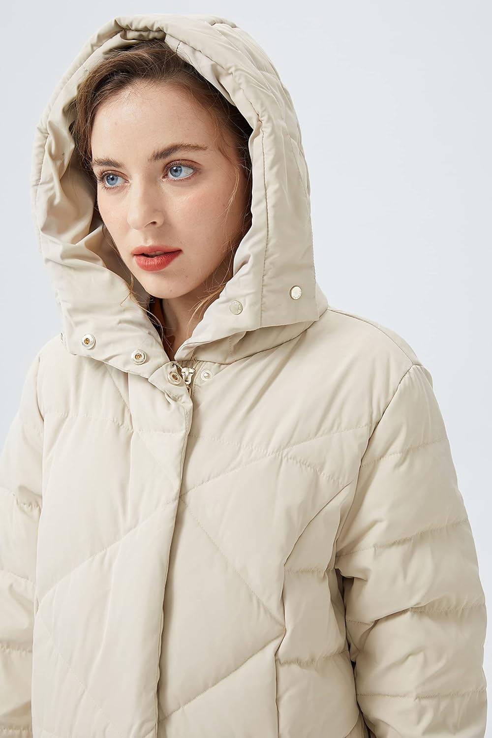 Women’s beige hooded puffer down coat with snap front and drawstring detail