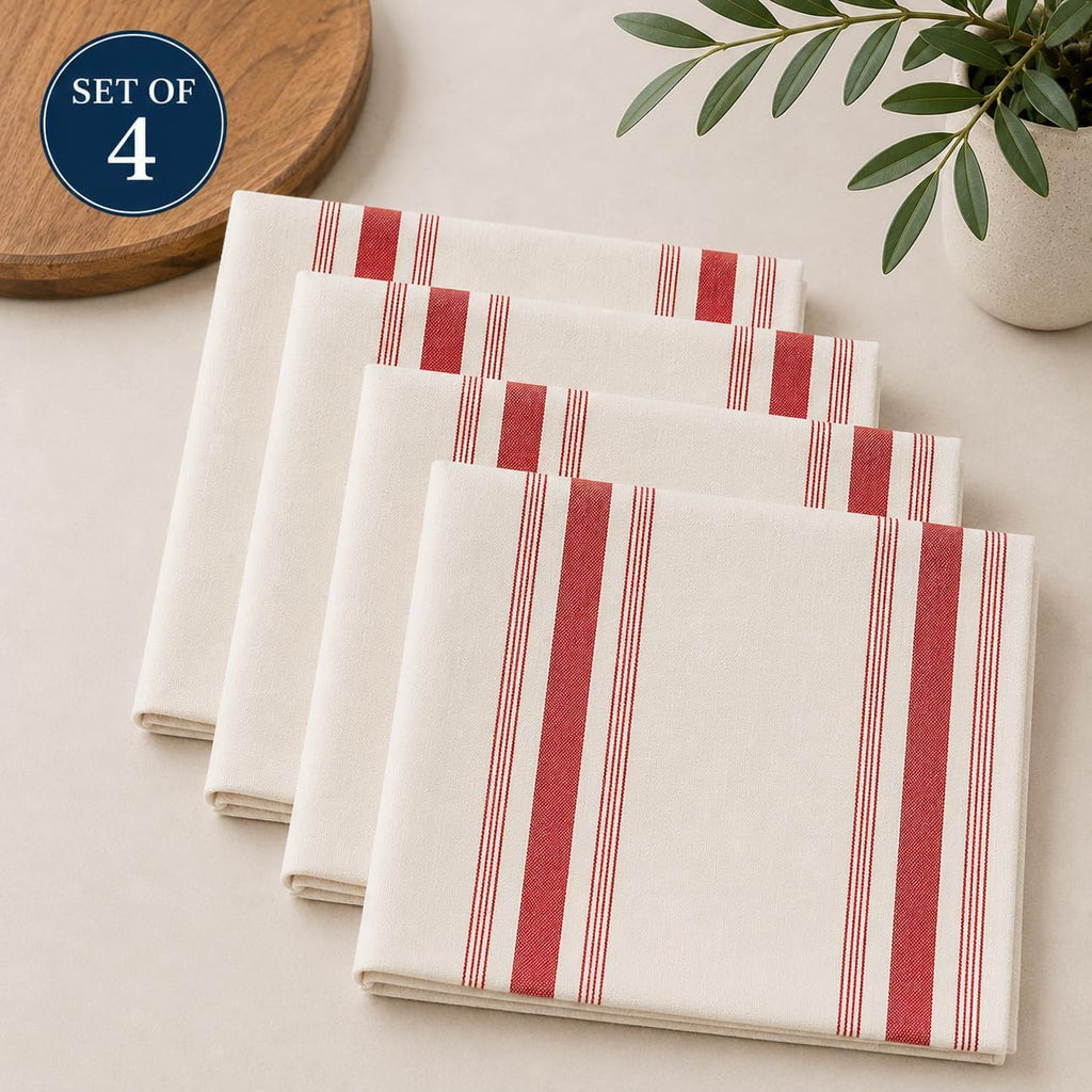 Folded beige cloth napkins, set of 4, with vertical red and white stripes