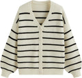 Women’s striped knit cardigan with button front and V-neck, cream with black stripes.