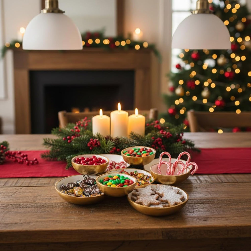 Set of 9 round enamel serving bowls with assorted snacks on a wooden table