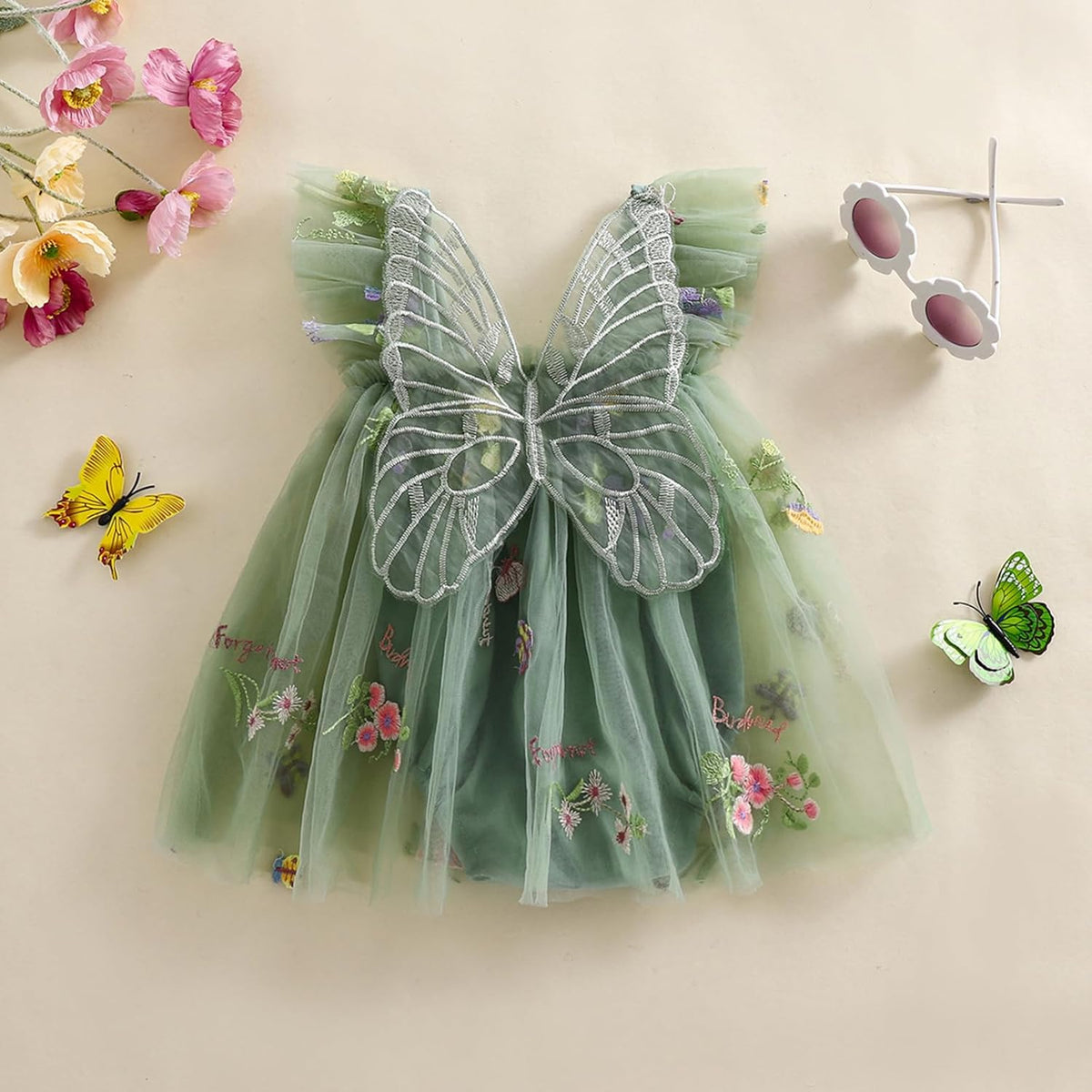 Green sleeveless tulle fairy dress with butterfly wings bodice and floral embroidery