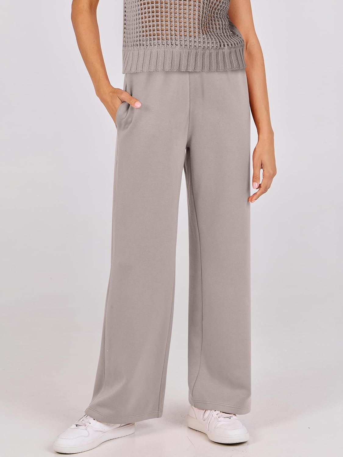 Light gray wide-leg lounge pants with smooth knit finish and drawstring waist