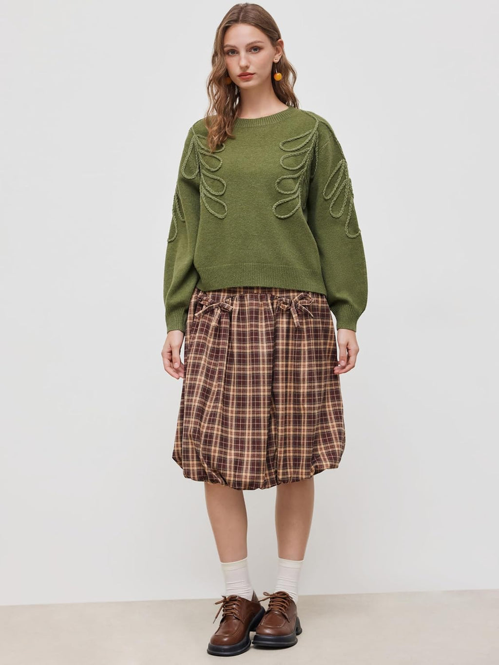 Olive green oversized round-neck sweater with long sleeves and looped leaf embroidery